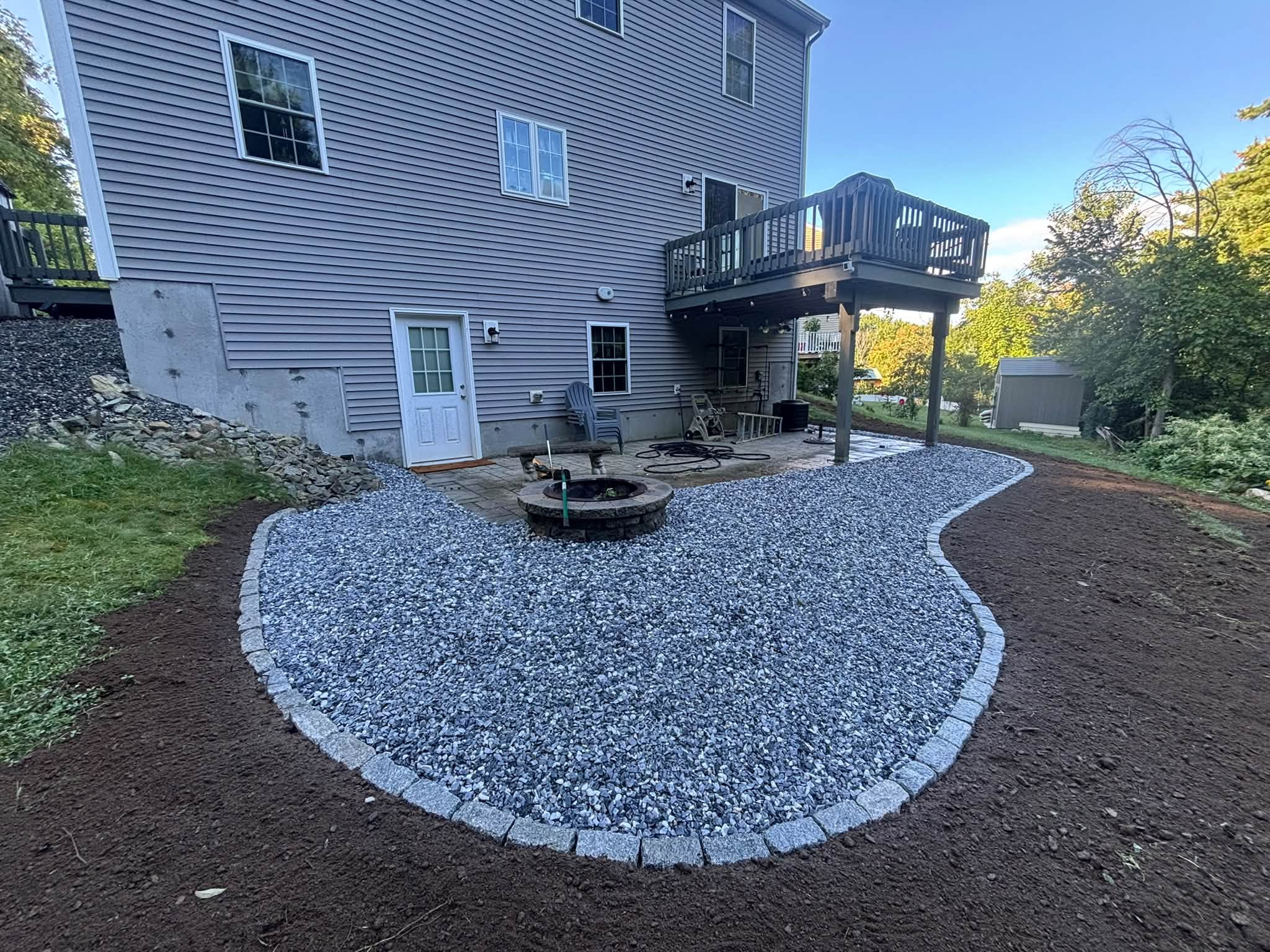 After — finished cobblestone border with lawn — Spencer, MA